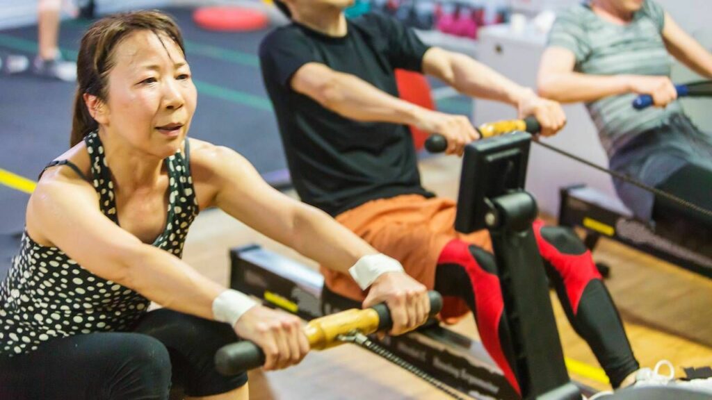 Woman Exercising on rowing machine