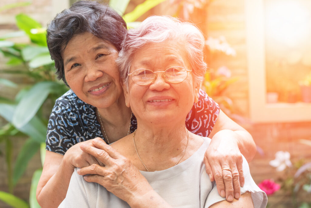 Asian mother and daughter smiling