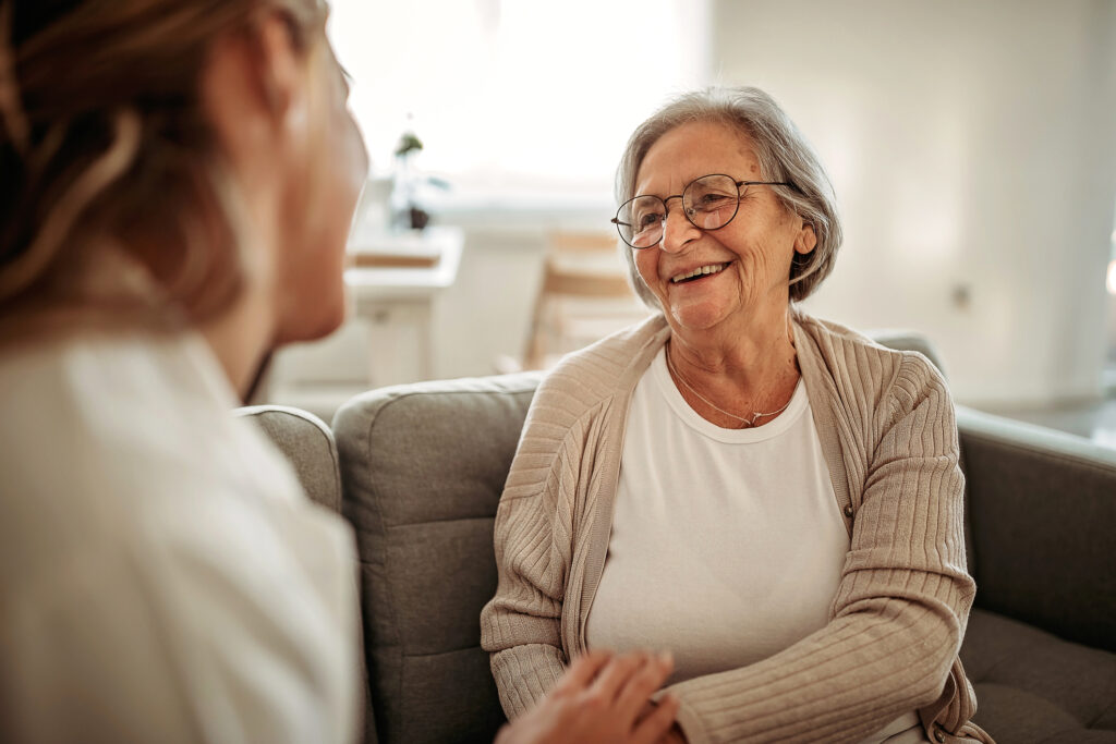 Senior woman speaking with her provider