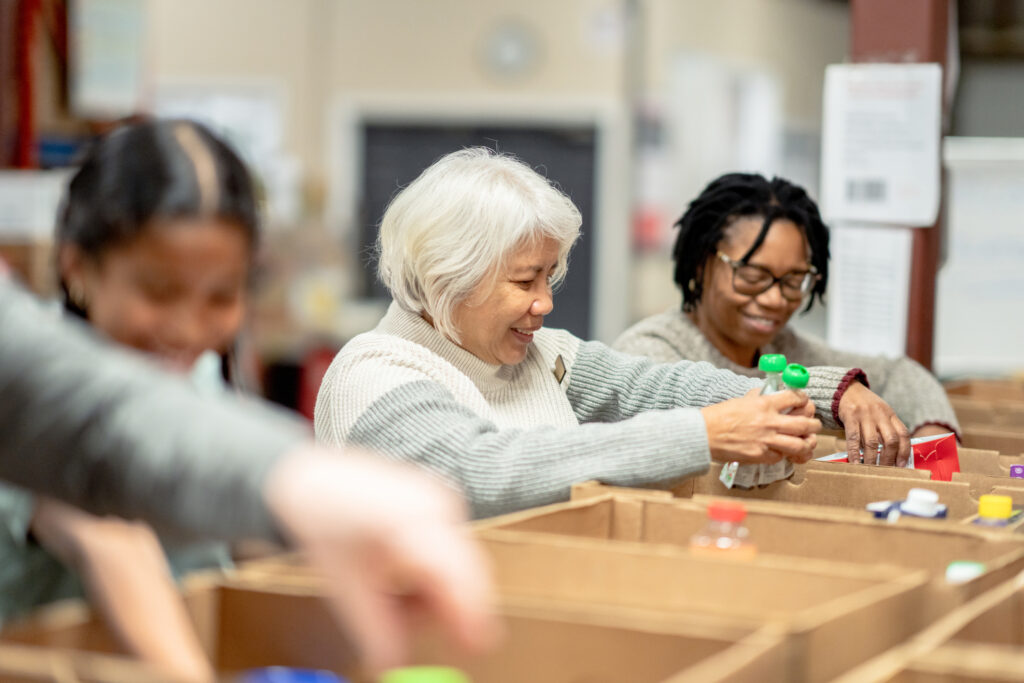 Elderly woman organizing items